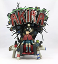 McFarlane Toys Akira Akira en Trono Blister con Detalle